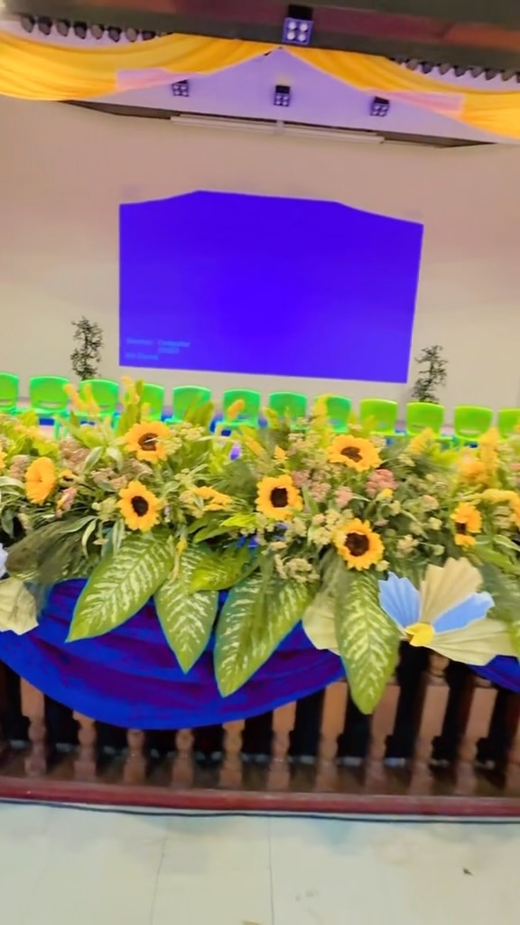 Corporate event sunflower stage decoration by GiGi Events Ph